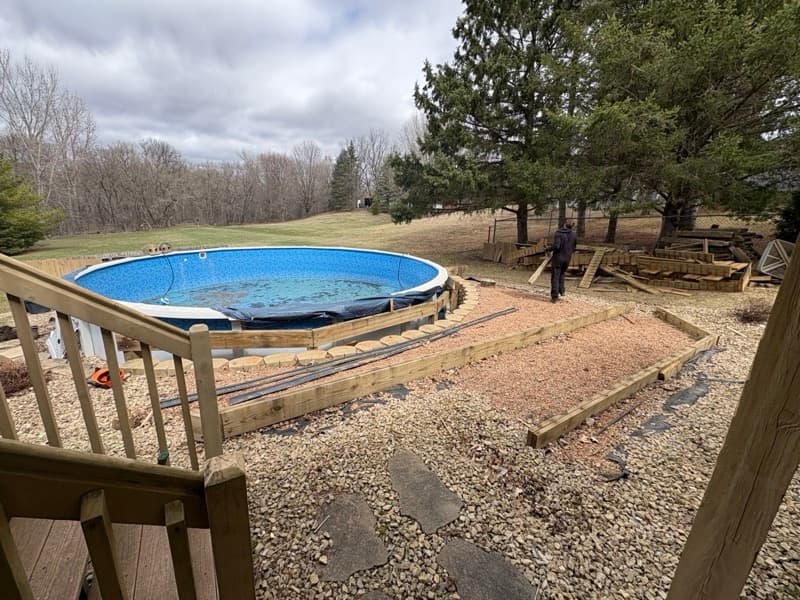 Above-ground pool and deck being removed